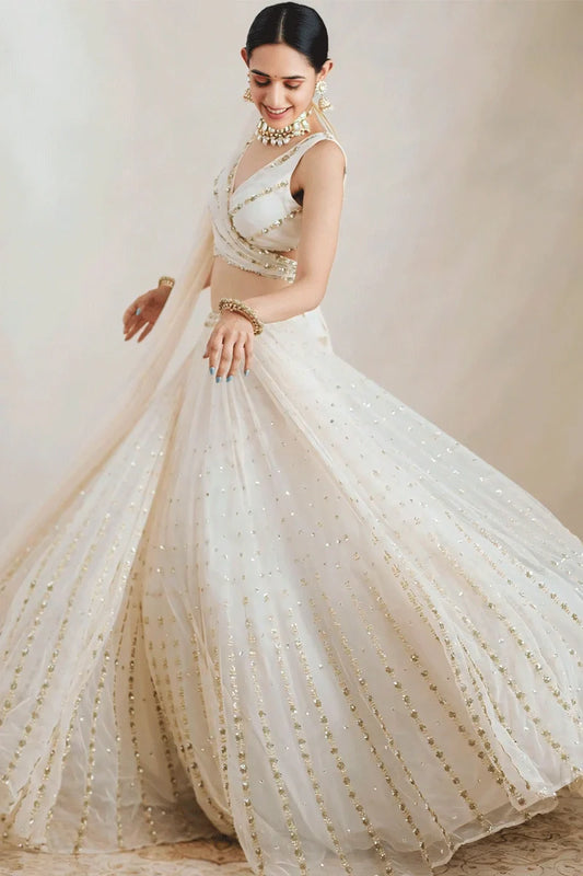 Sequence Work Off White Colour Lehenga Choli For Sangeet