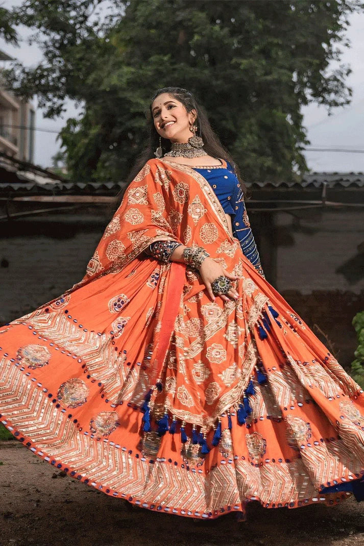 Traditional Heavy Flair Orange Chaniya Choli For Garba