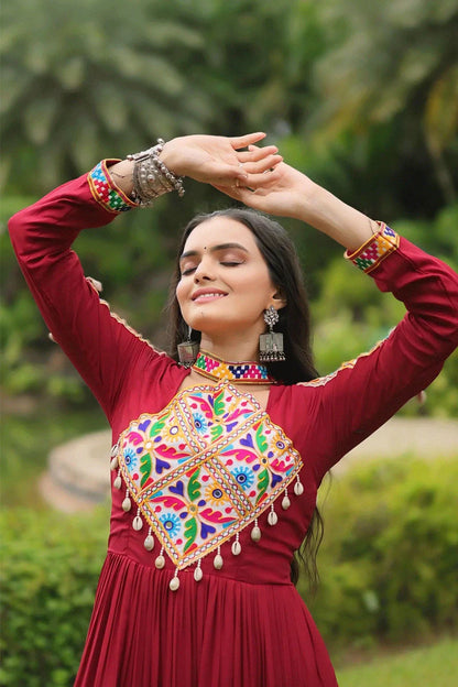 Heavy Flair Inner Cotton Fabric Maroon Gown For Garba