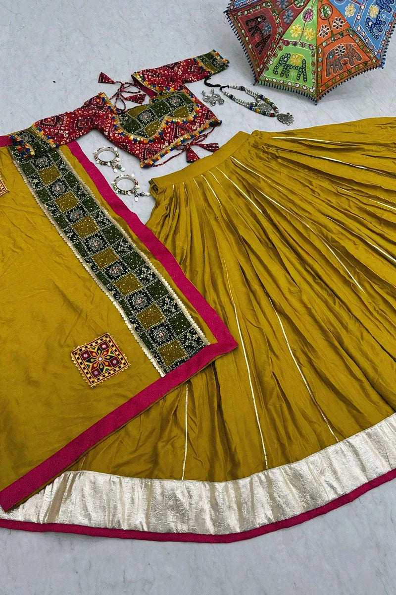 Yellow Lehenga Choli With Bandhani Blouse Design For Garba
