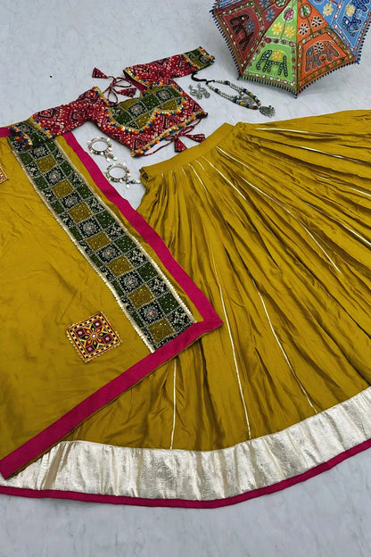 Yellow Lehenga Choli With Bandhani Blouse Design For Garba